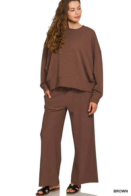 Zenana Ribbed Round Neck Pullover and Drawstring Pants Set for Women in brown, featuring a relaxed fit pullover and wide-leg pants.