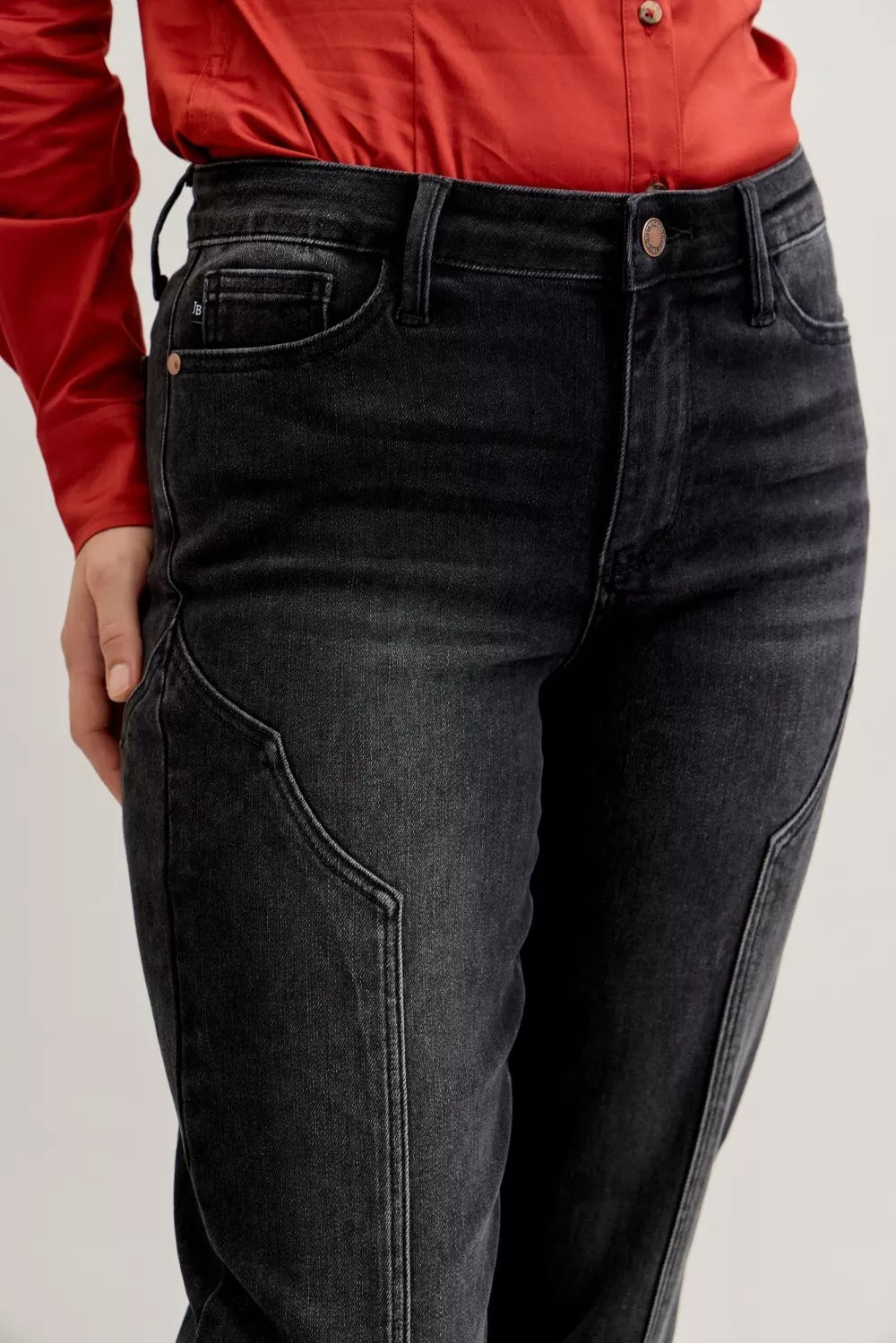 Judy Blue Mid Rise Straight Western Seam Jeans shown on model, highlighting mid-rise waist and western seam detail.