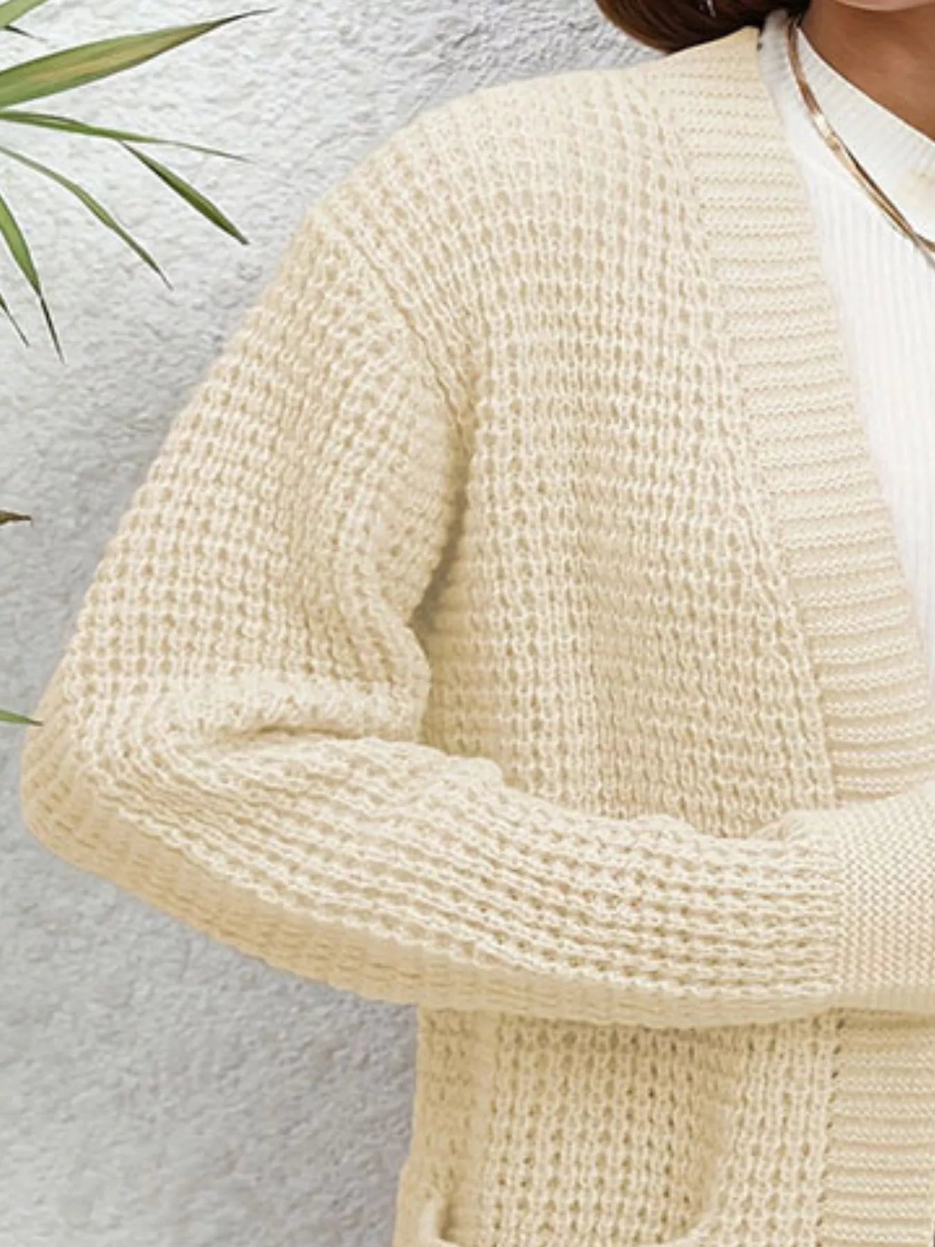 Close-up view of the Chunky Knit Open Front Cardigan in cream, highlighting its textured knit design for cozy layering.