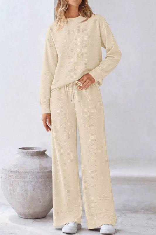 Round Neck Long Sleeve Top and Pants Set in a chic cream color, perfect for casual outings and lounging.