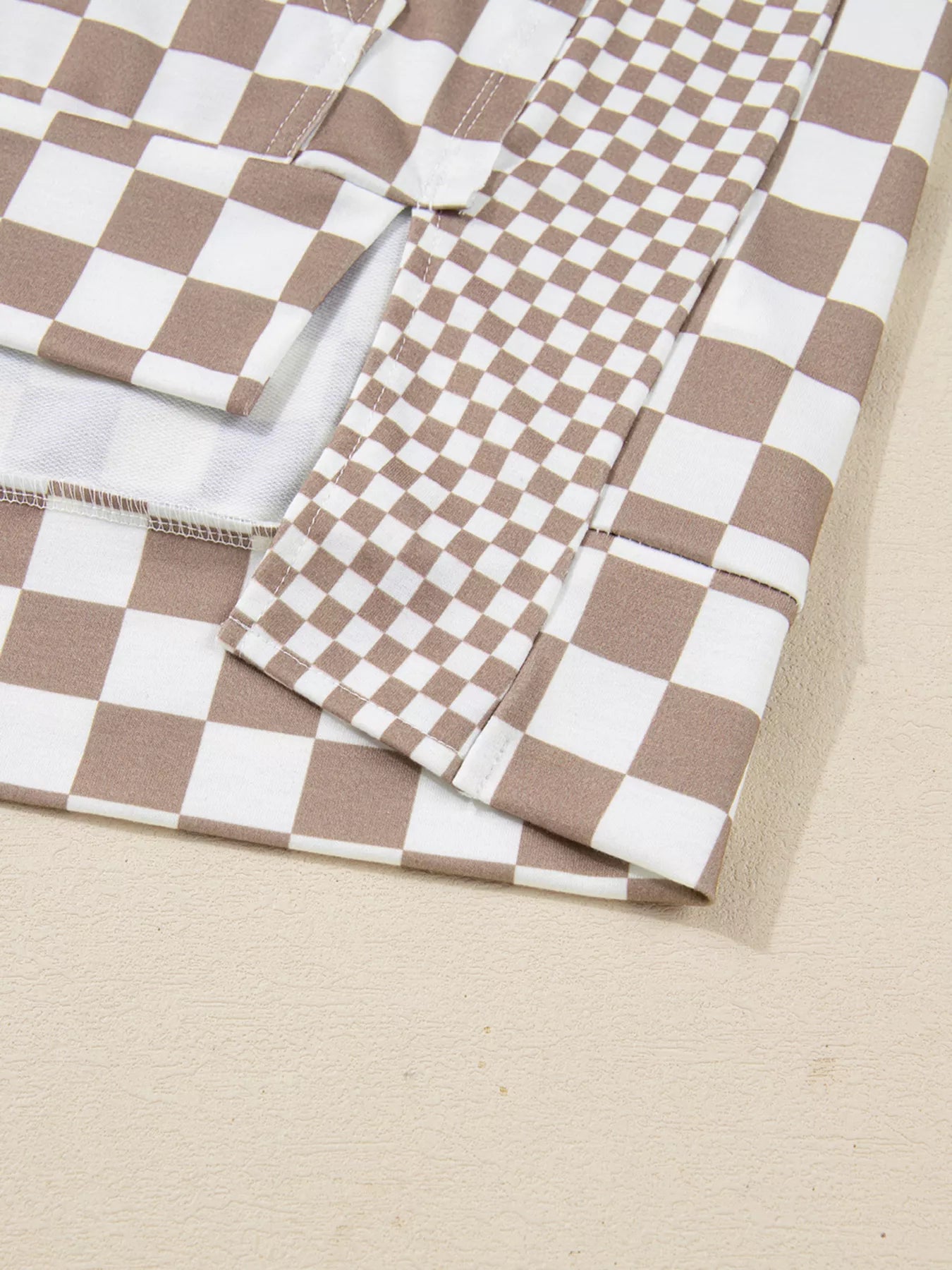 Checkered Pattern Oversized Drawstring Hoodie showing the fabric and design details in a close-up shot.