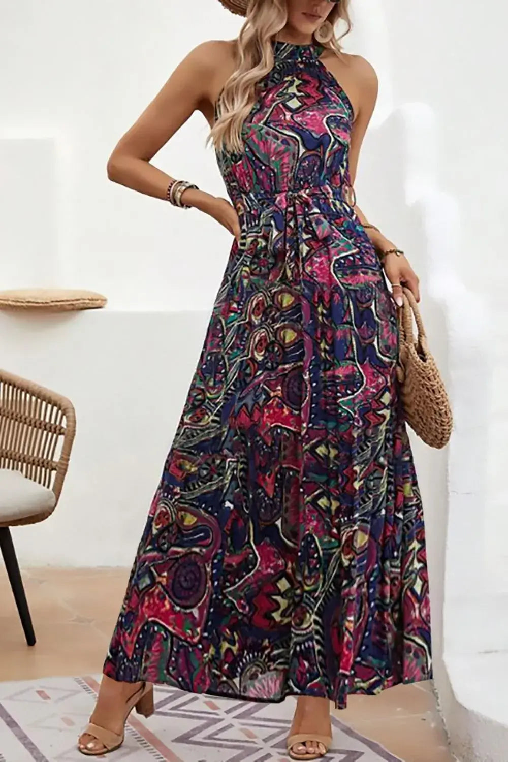 Tied Floral Sleeveless Dress displayed on a model, featuring bright colors and a stylish design for summer elegance.