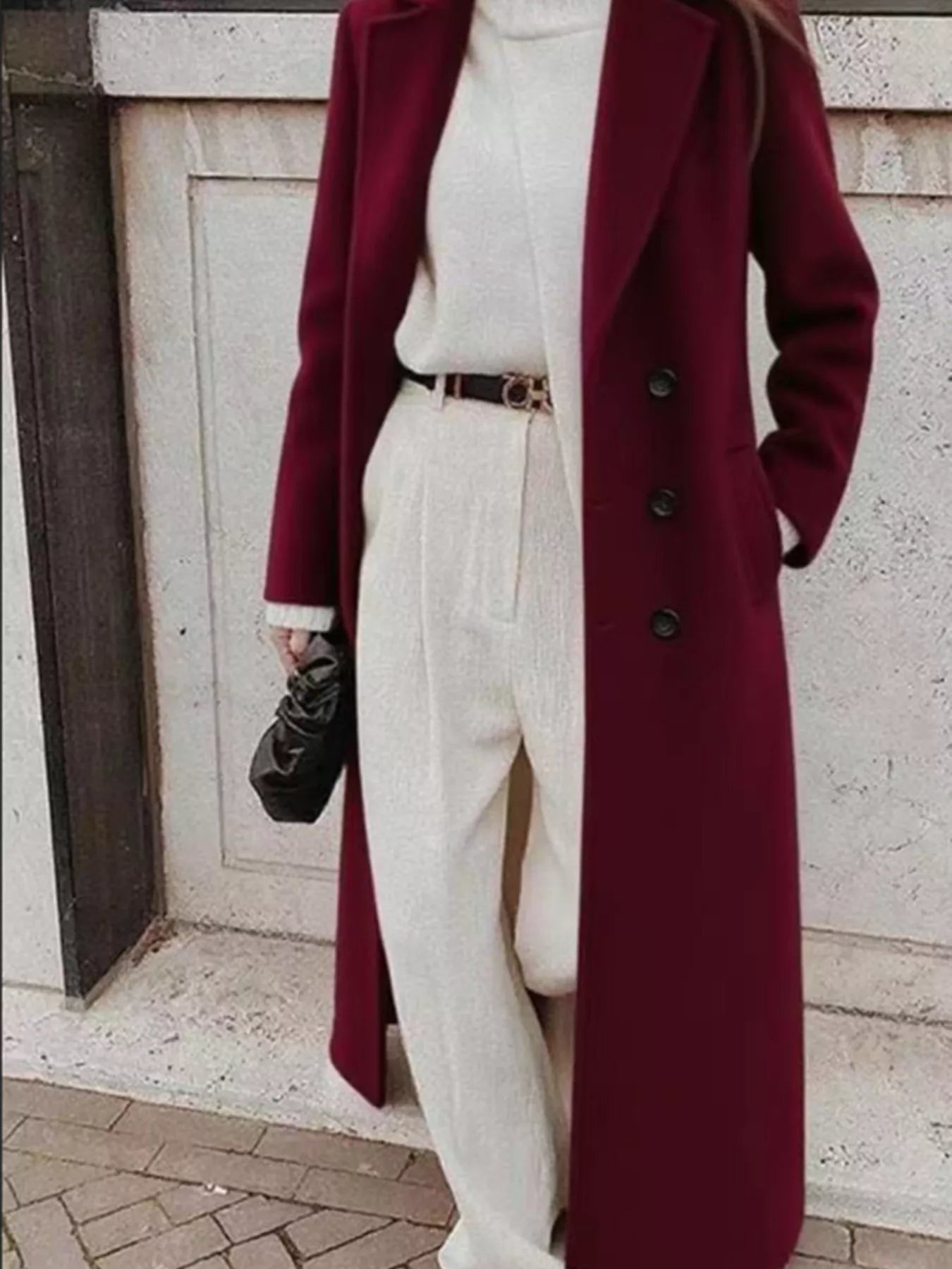 Double Breasted Longline Overcoat worn over a stylish cream outfit, showcasing elegance and classic design.