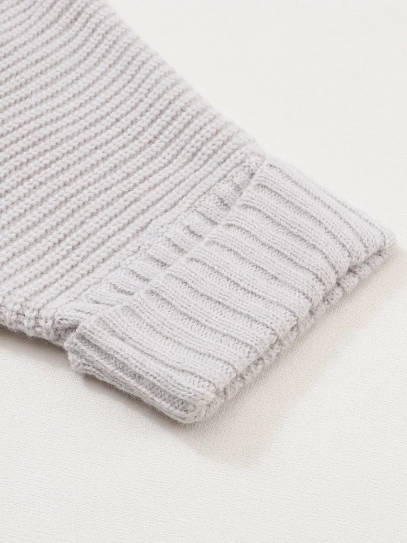 Close-up of the ribbed sleeve cuff of an Oversized Fold Over Sleeve Open Front Cardigan for Women.