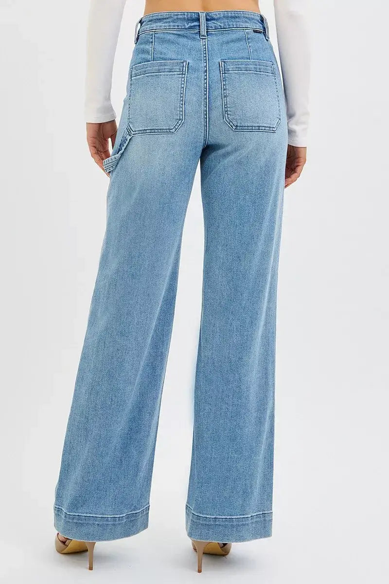 Back view of RISEN Plus Size High Rise Straight Leg Jeans showcasing pockets and a relaxed fit.