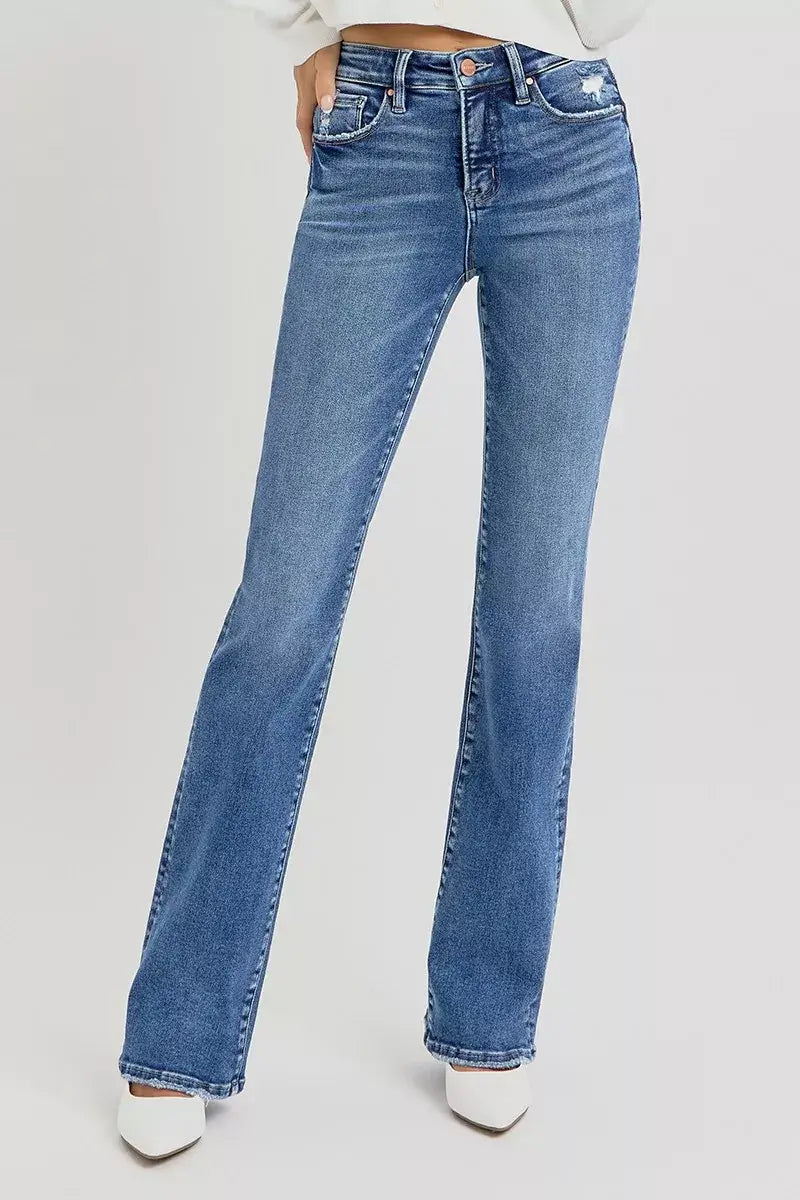 RISEN High Rise Straight Plus Size Jeans with tummy control in a classic blue wash, perfect for a confident fit.