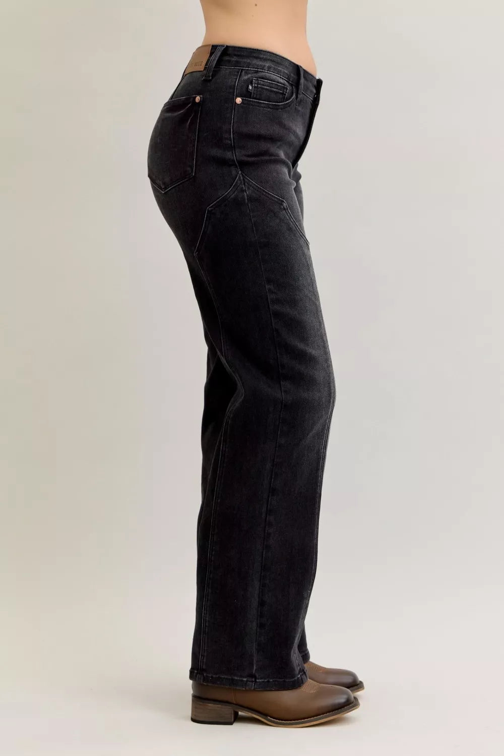 Judy Blue Mid Rise Straight Western Seam Jeans shown from the side, featuring a flattering mid-rise and straight-leg design.