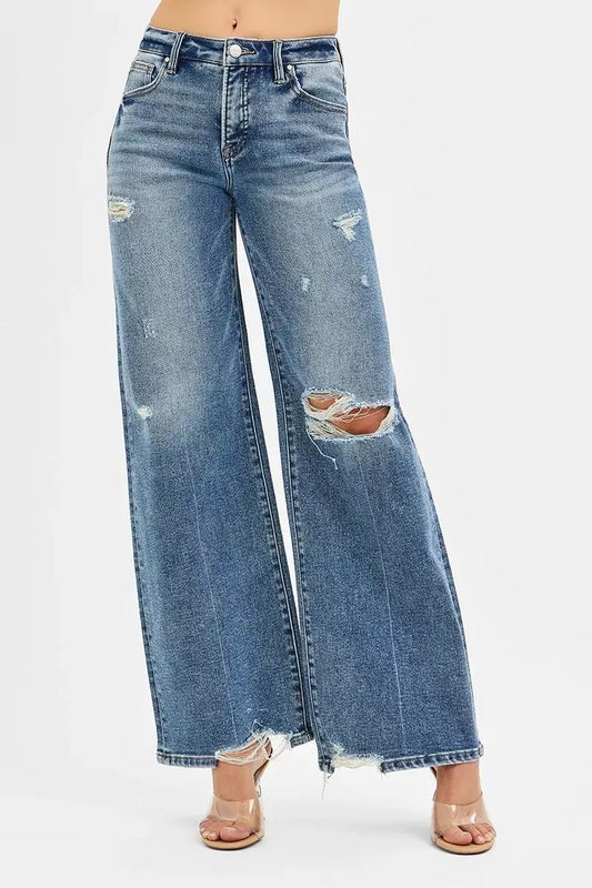 RISEN Tummy Control Mid Rise Fit Wide Jeans in distressed blue denim with a stylish raw hem.