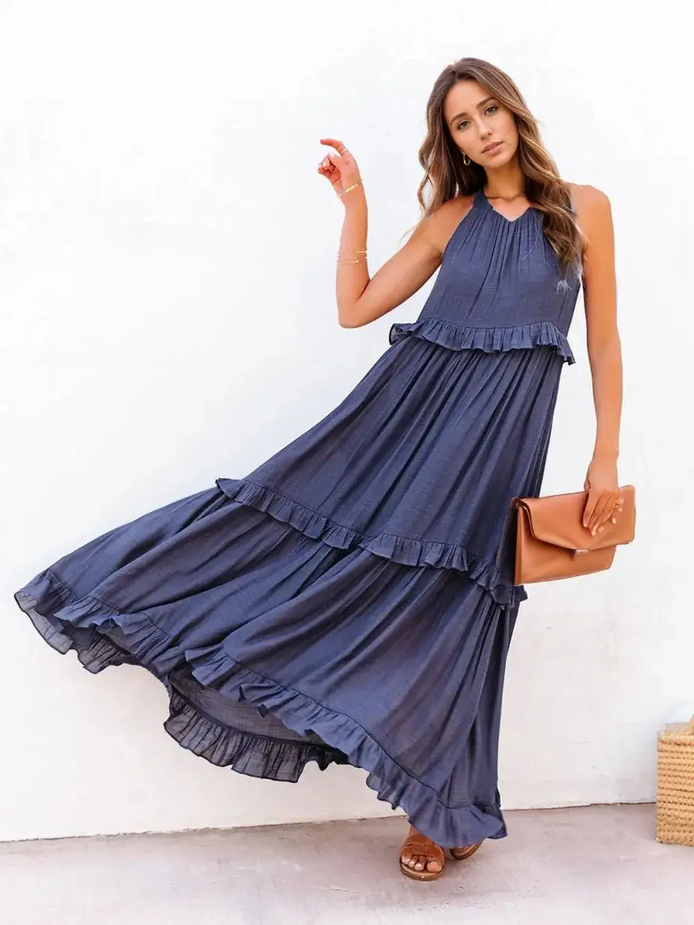 Ruffled Sleeveless Tiered Maxi Dress with Pockets shown in elegant pose, perfect for casual outings.
