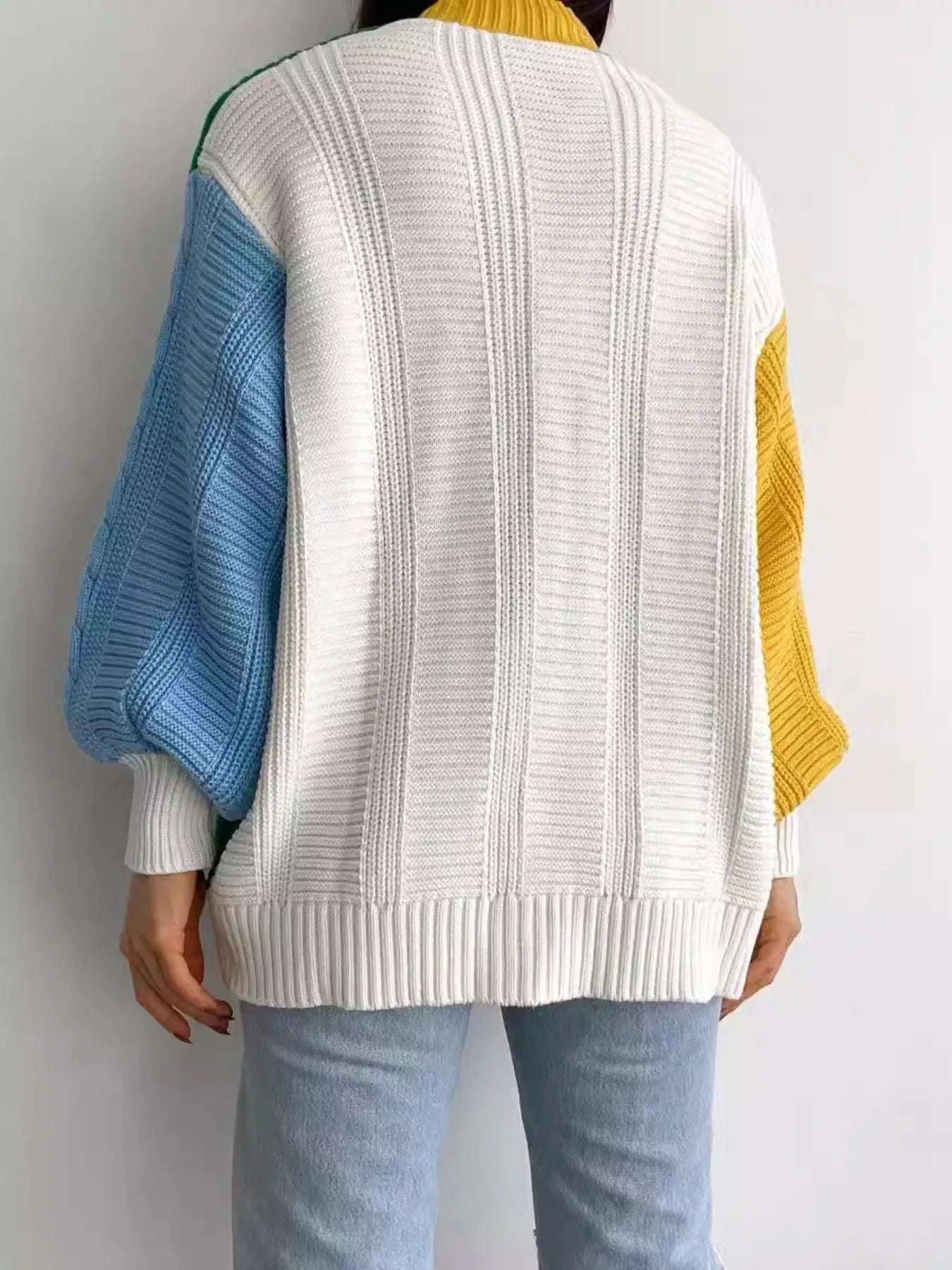 Color Block Button Down Cable-Knit Cardigan – Cozy Knit Layer showcasing colorful cable-knit design from the back.