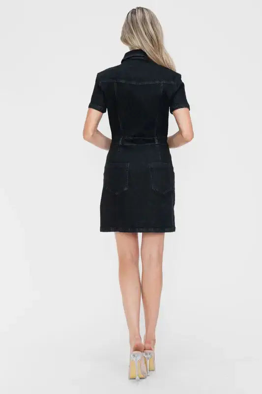 Back view of Bytos Full Size Button Down Short Sleeve Denim Dress with pockets and fringe detailing.