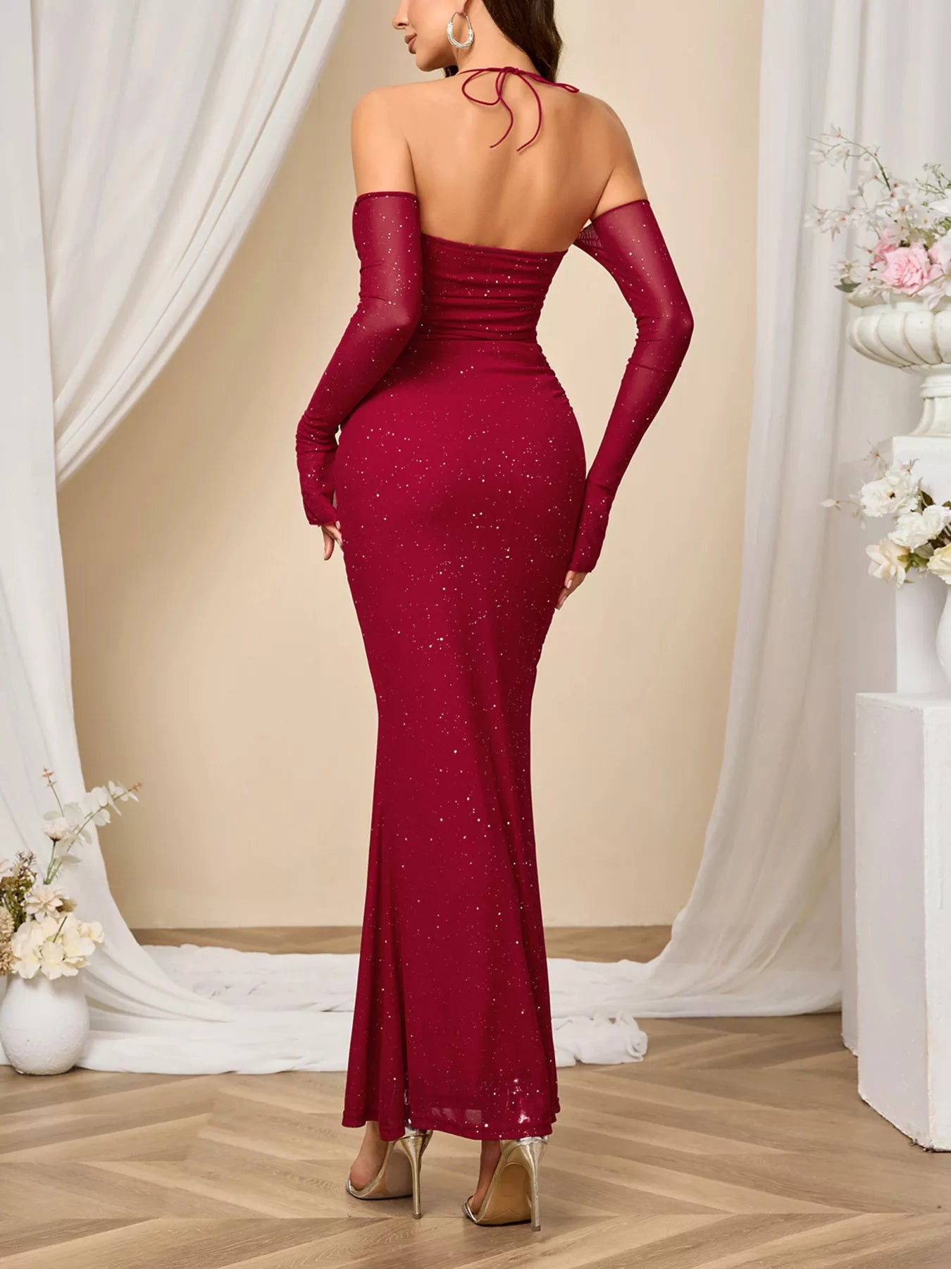 Glitter Sweetheart Neck Long Sleeve Maxi Dress in burgundy, showcasing a tied back and form-fitting silhouette for elegant events.