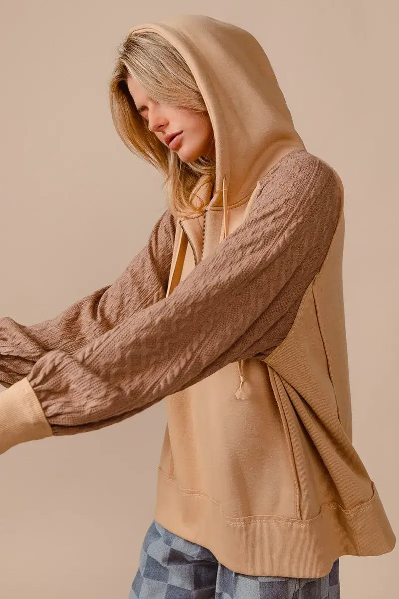 BiBi Half Zip French Terry Hoodie with Knit Sleeves in a stylish beige design, featuring a hood and long knit sleeves.