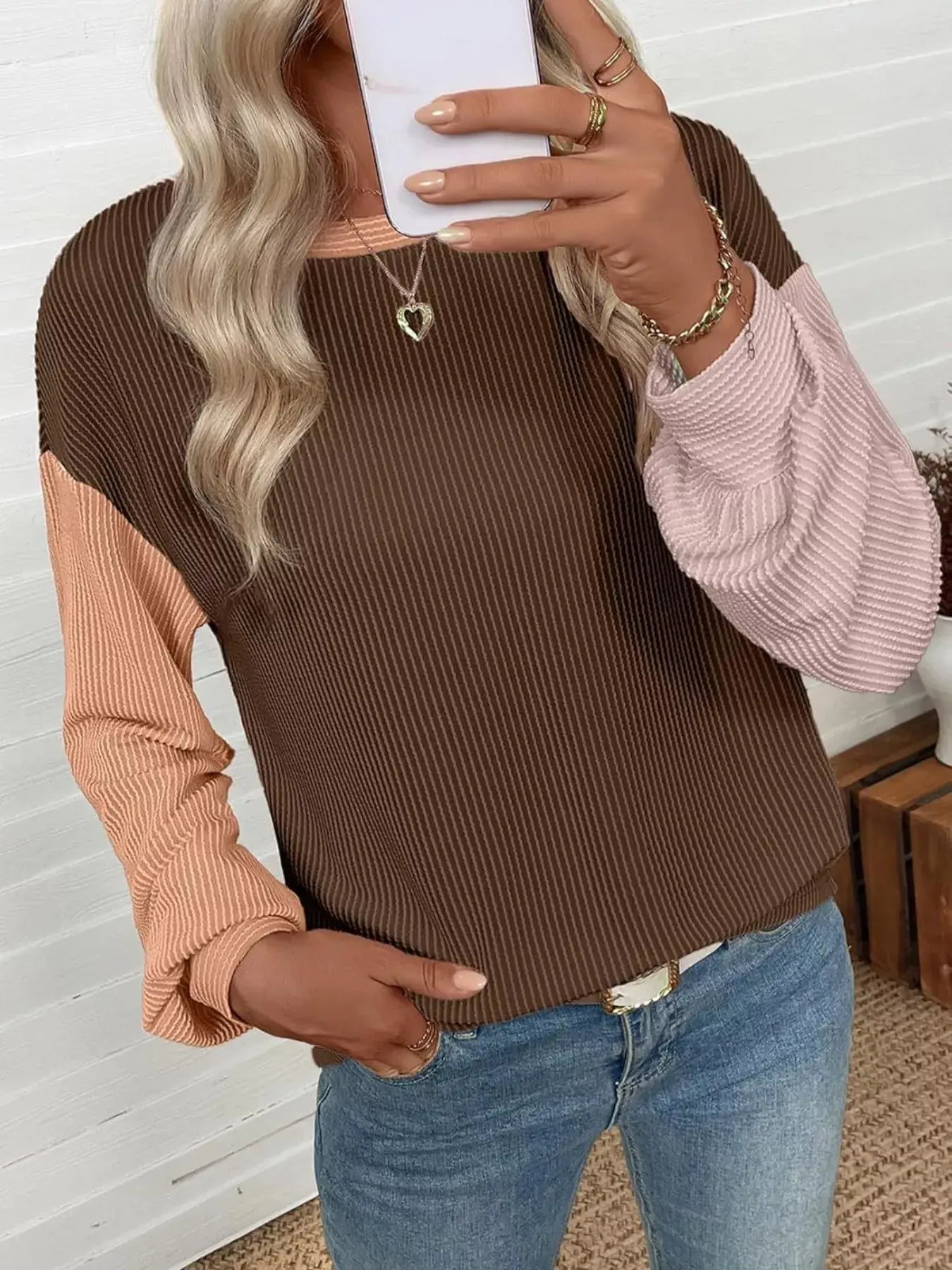 Woman wearing a Color Block Ribbed Long Sleeve T-Shirt in brown and pink, showcasing a casual chic style.