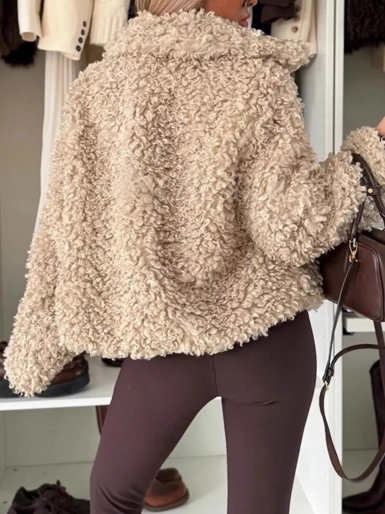 Sherpa Button-Down Outerwear shown from the back, featuring cozy beige texture for everyday layering.