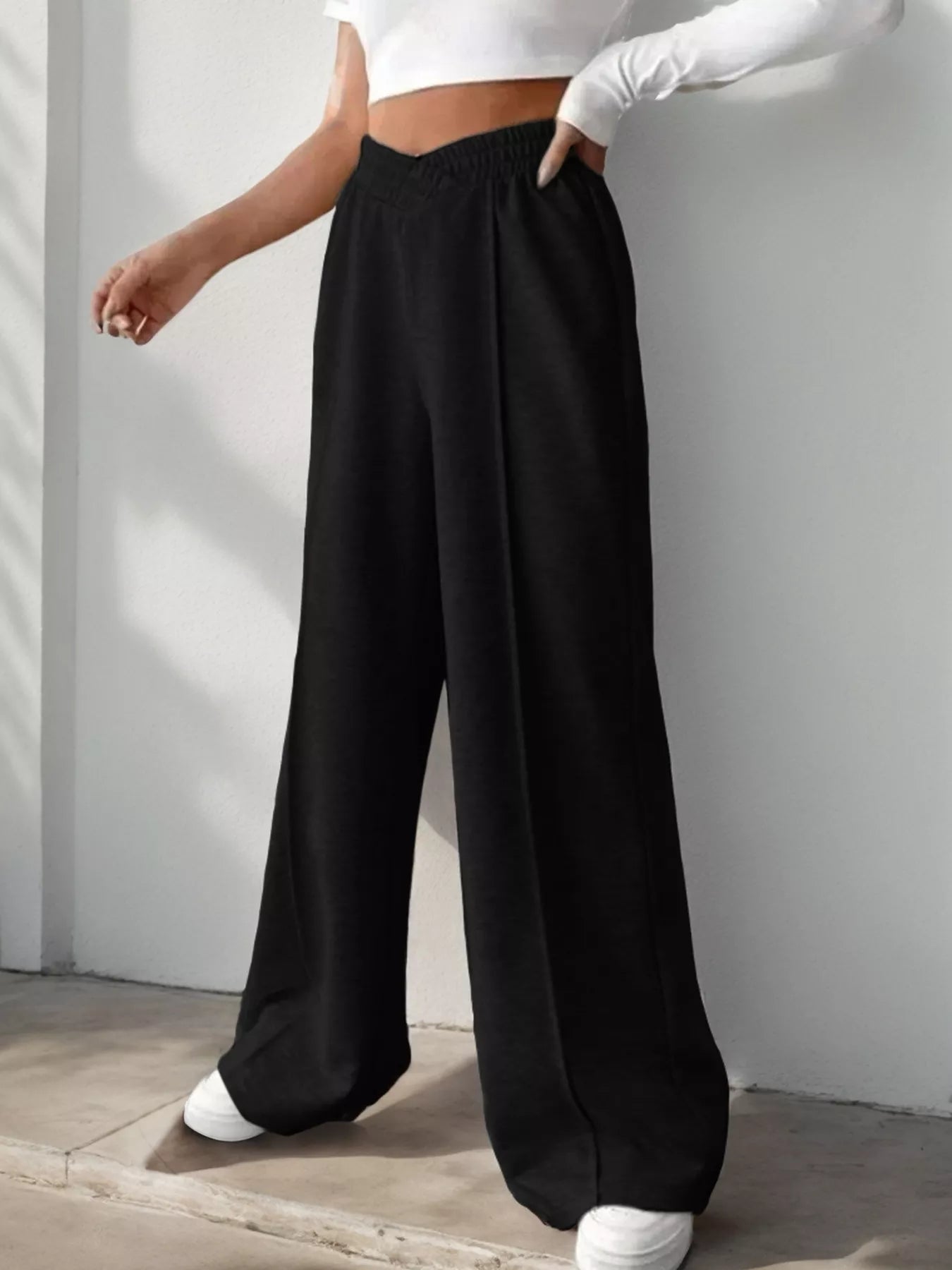 Wide Leg High Waist Pants showcased in black, ideal for elegant everyday style with a relaxed fit.