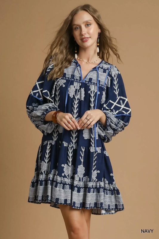 Umgee Tribal Print Dress with Tie Neck featuring balloon sleeves and a relaxed fit, perfect for boho chic style.