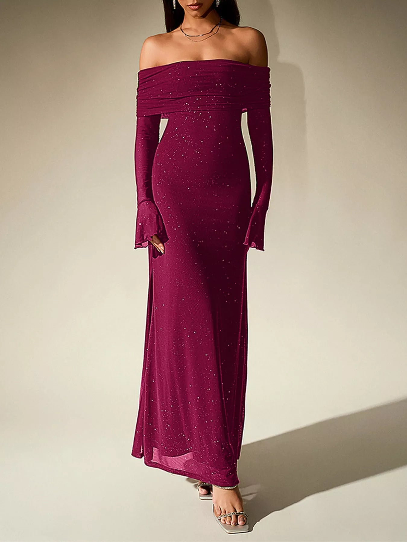 Glitter Off-Shoulder Maxi Dress featuring a stretchy design and sparkling embellishments for elegant evening looks.