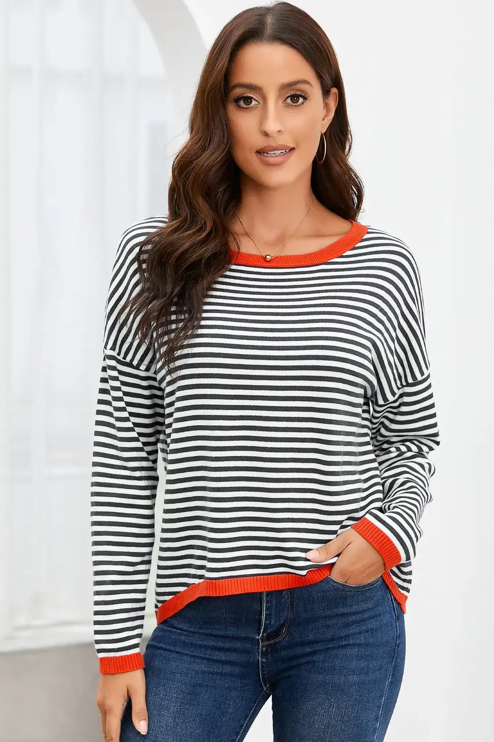 Model wearing Striped Round Neck Drop Shoulder T-Shirt with horizontal stripes and relaxed fit.
