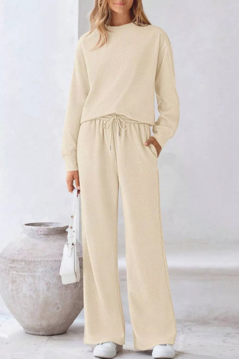 Round Neck Long Sleeve Top and Pants Set in beige, featuring a round neckline, long sleeves, and drawstring waist.
