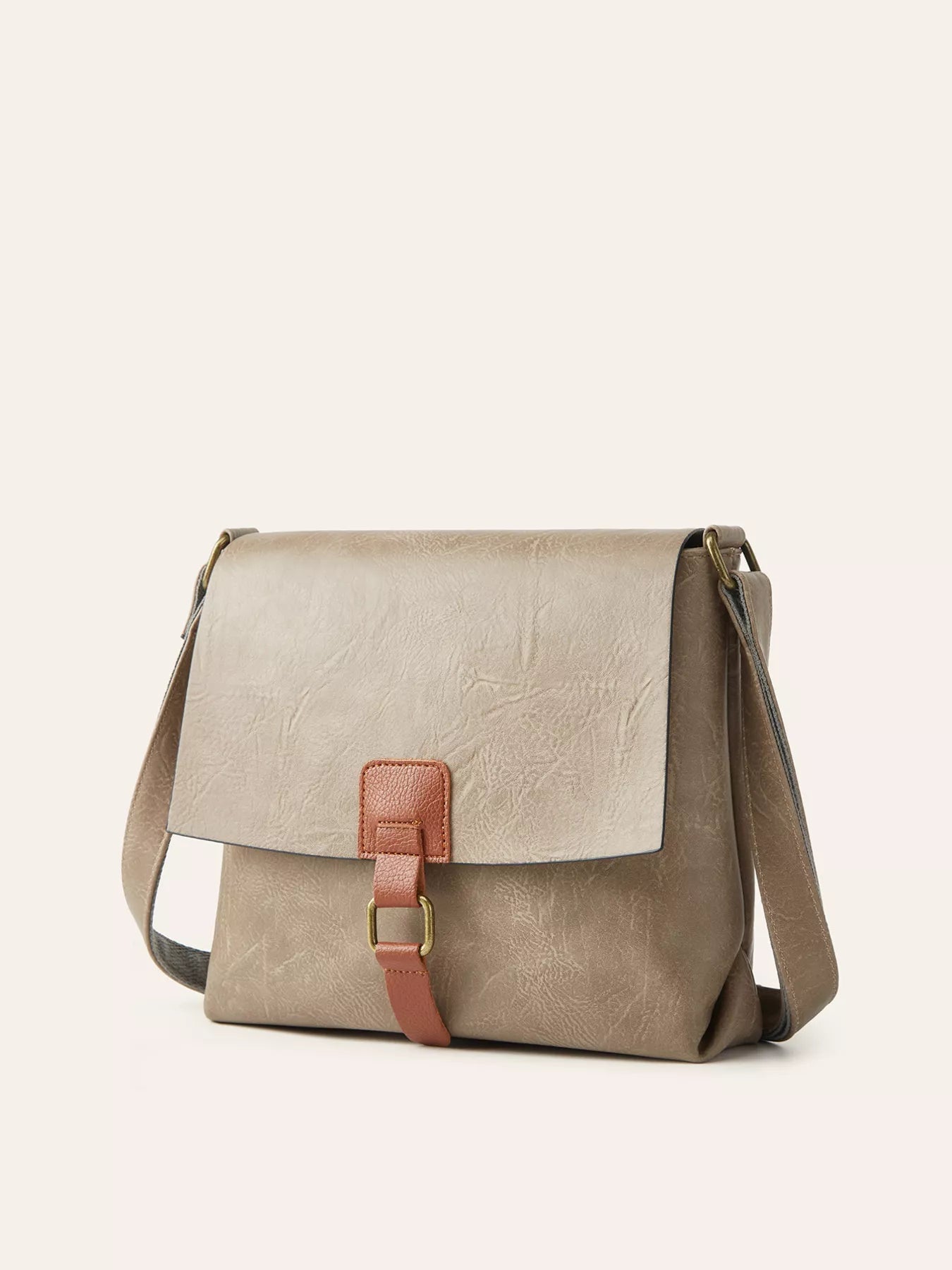 Vintage Buckle Flap Crossbody Bag in PU leather with adjustable strap and retro design.