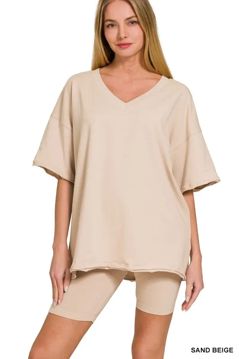 Zenana Cotton V-neck Top & Biker Shorts Set for Women in sand beige, featuring a relaxed V-neck top and fitted biker shorts.