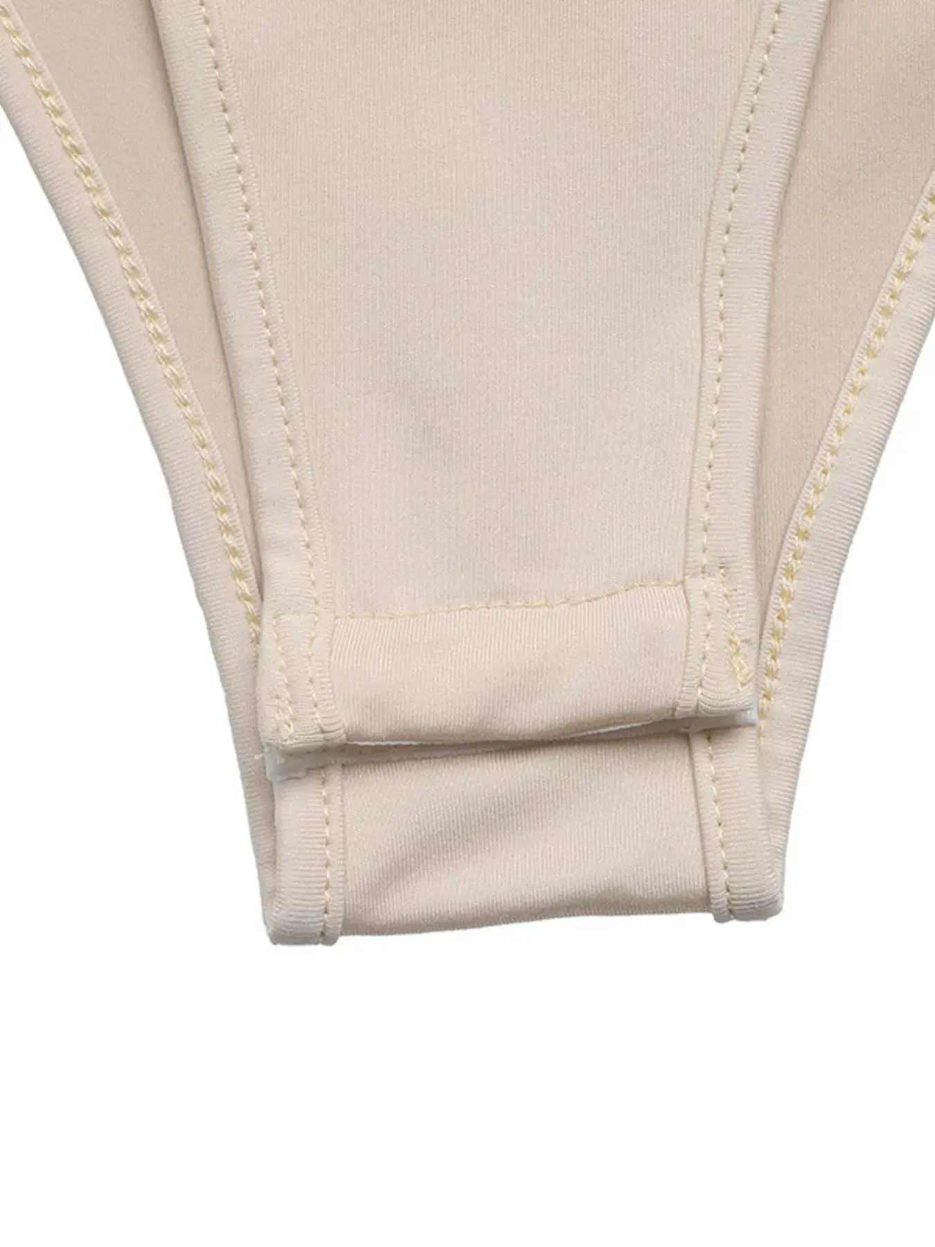 Close-up of the fabric detail on the sweetheart neck balloon sleeve bodysuit showcasing its soft texture and stitching.