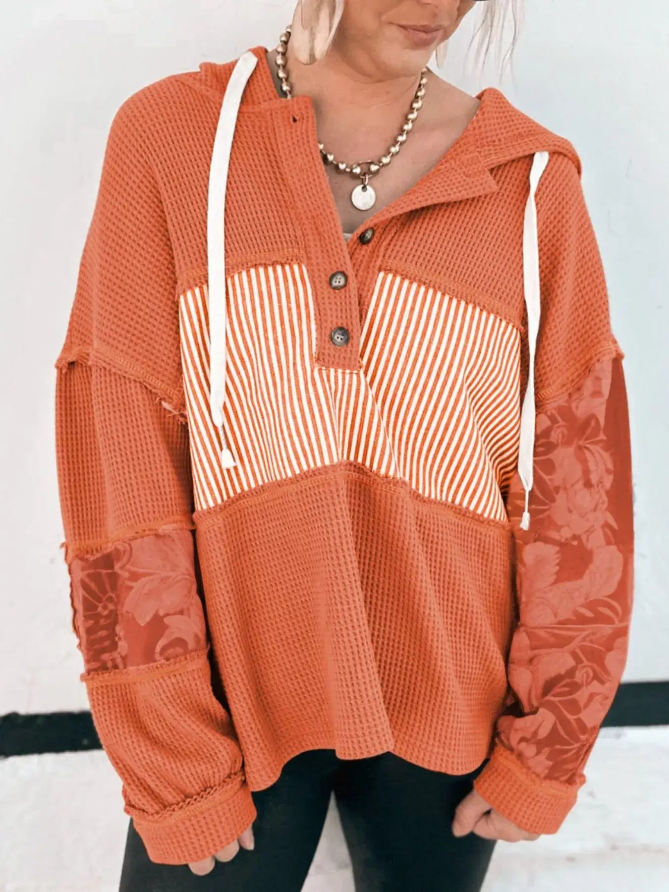 Waffle Knit Color Block Striped Drawstring Hoodie featuring textured fabric and bold color block design.