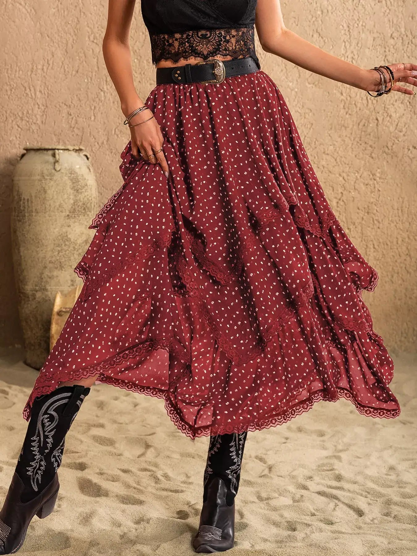 Lace Detail Layered Skirt in burgundy with polka dots, showcasing a flowy silhouette and feminine elegance.