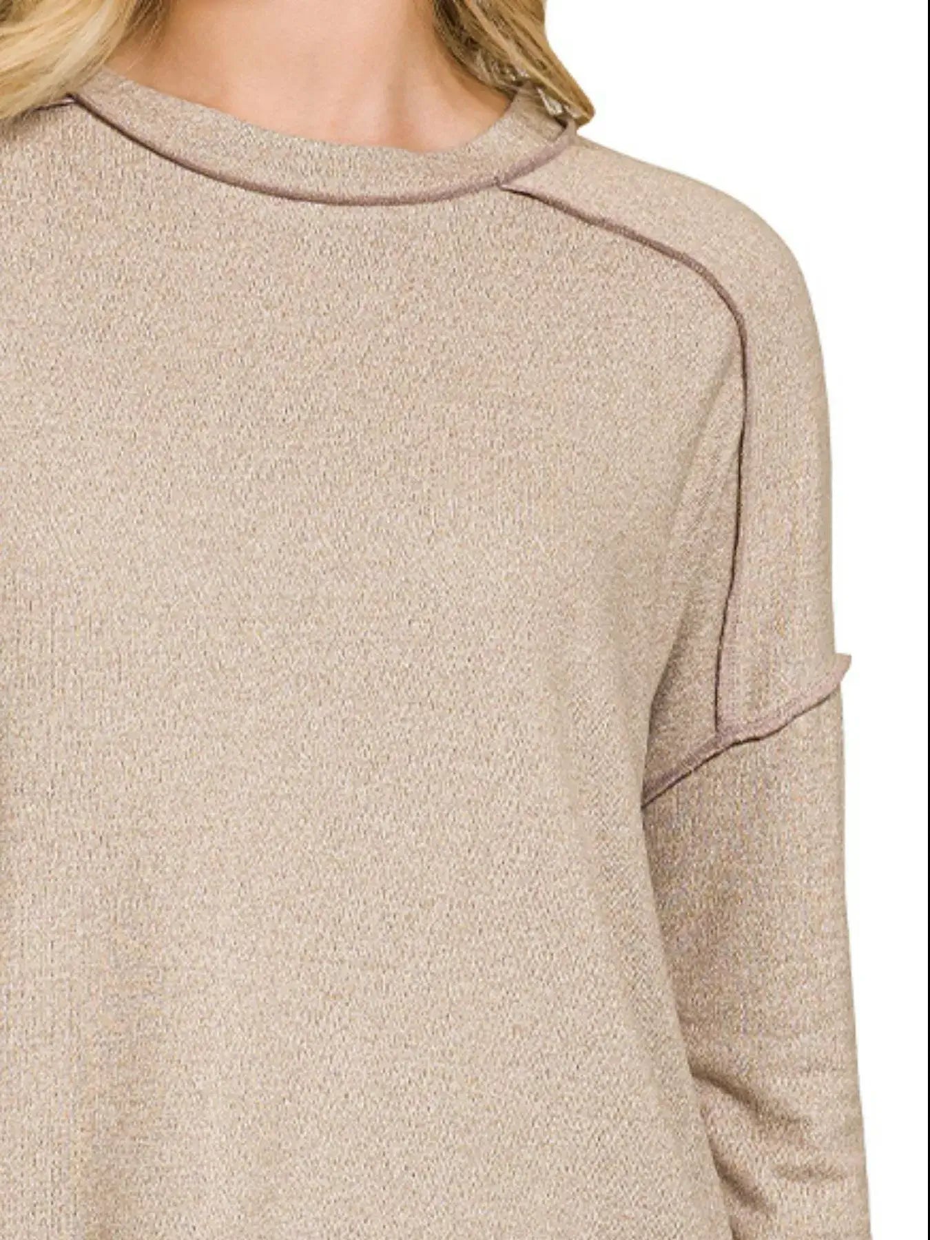 Zenana Full Size Melange Hacci Exposed Seam Hi-Low Tee with stylish exposed seam detailing.