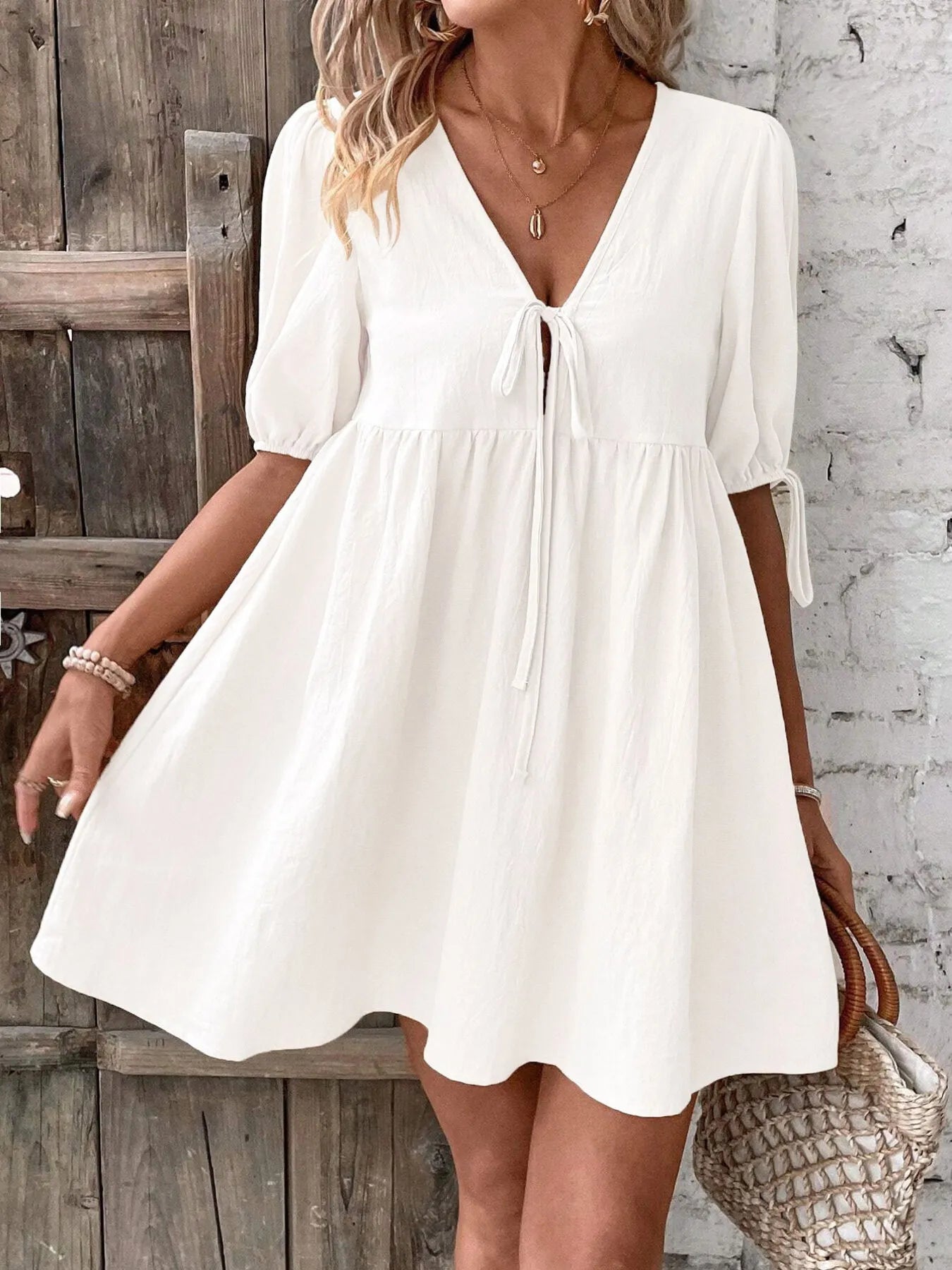 V-Neck Tie-Front Mini Dress with Puff Sleeves in white, featuring a tied front and flared silhouette.