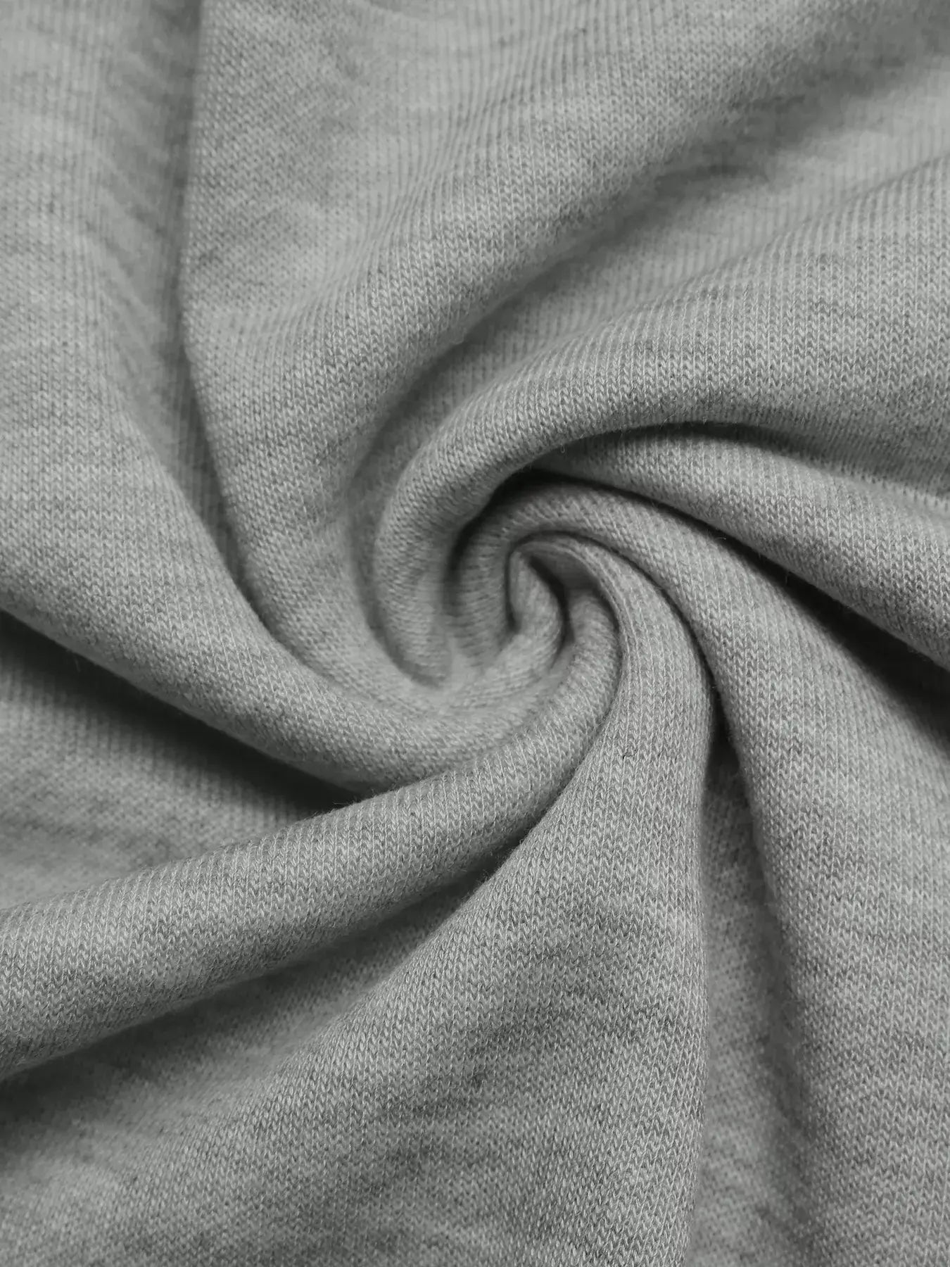 Close-up of soft fabric showcasing the texture of the Bow Detail Round Neck Sweatshirt material.