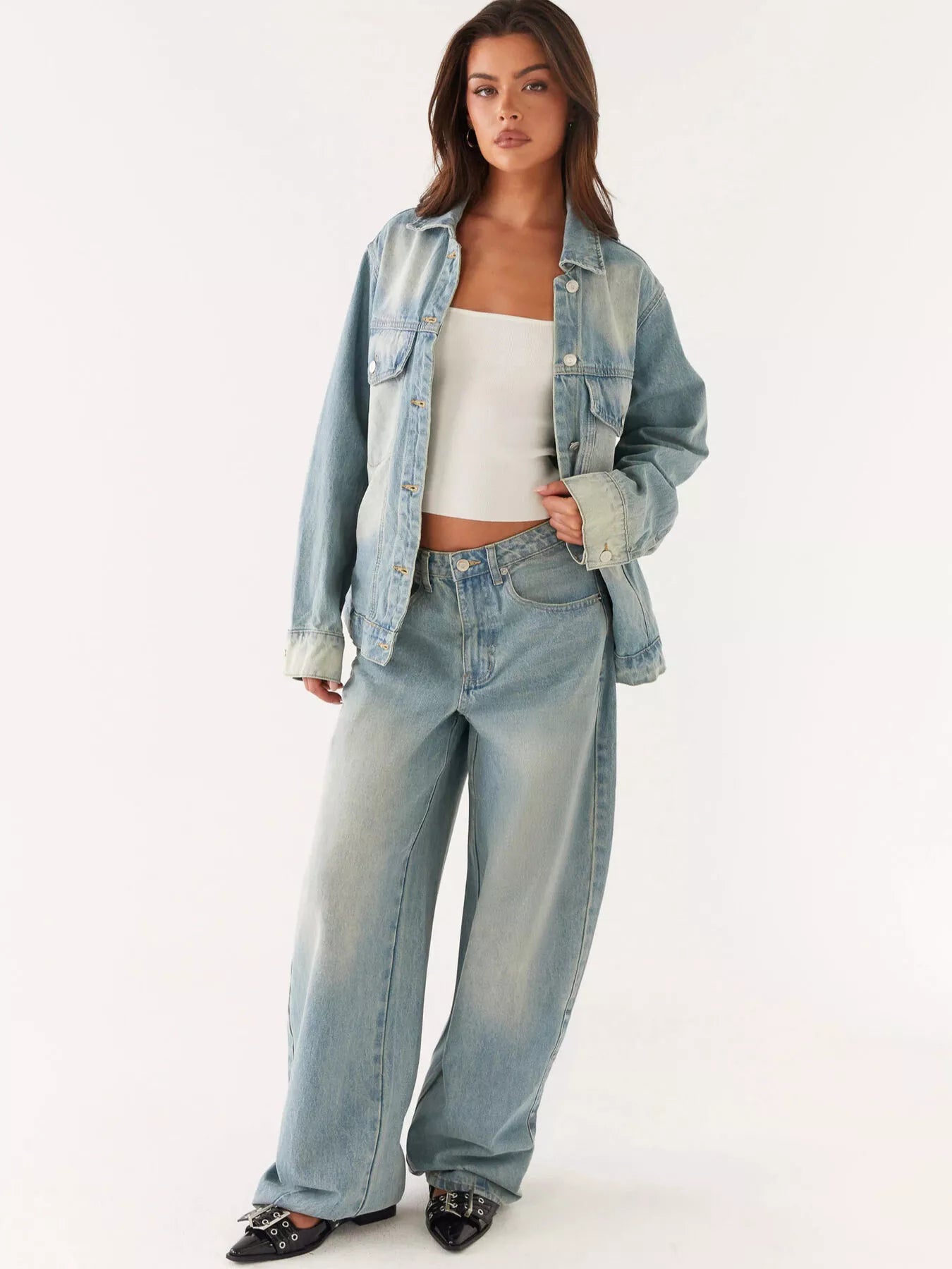 Button Up Denim Jacket and Jeans Set showcased on a model, featuring a buttoned design with pocketed styling.