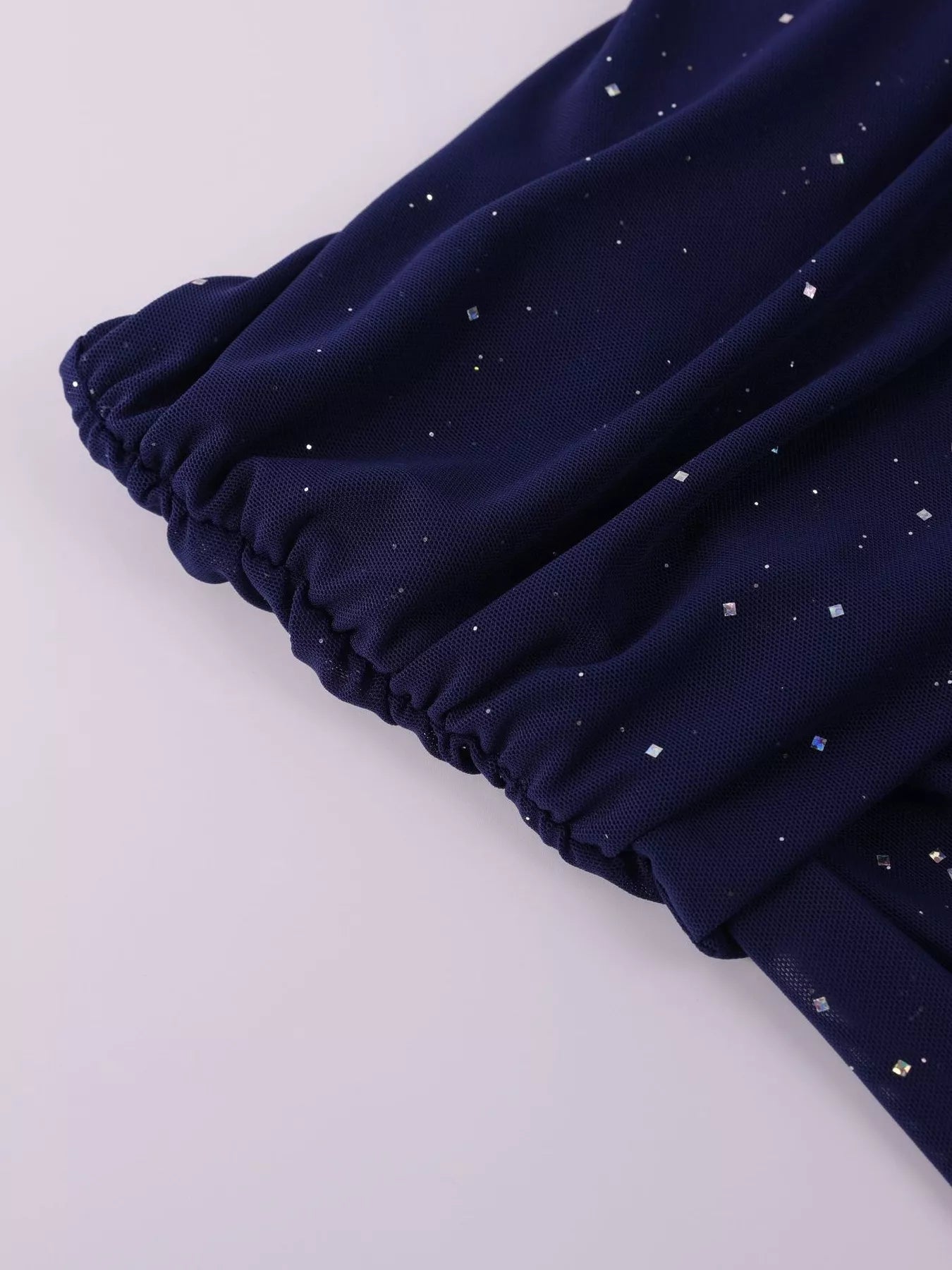 Glitter Off-Shoulder Maxi Dress showing the elegant gathered sleeve detail with shimmering glitter accents.