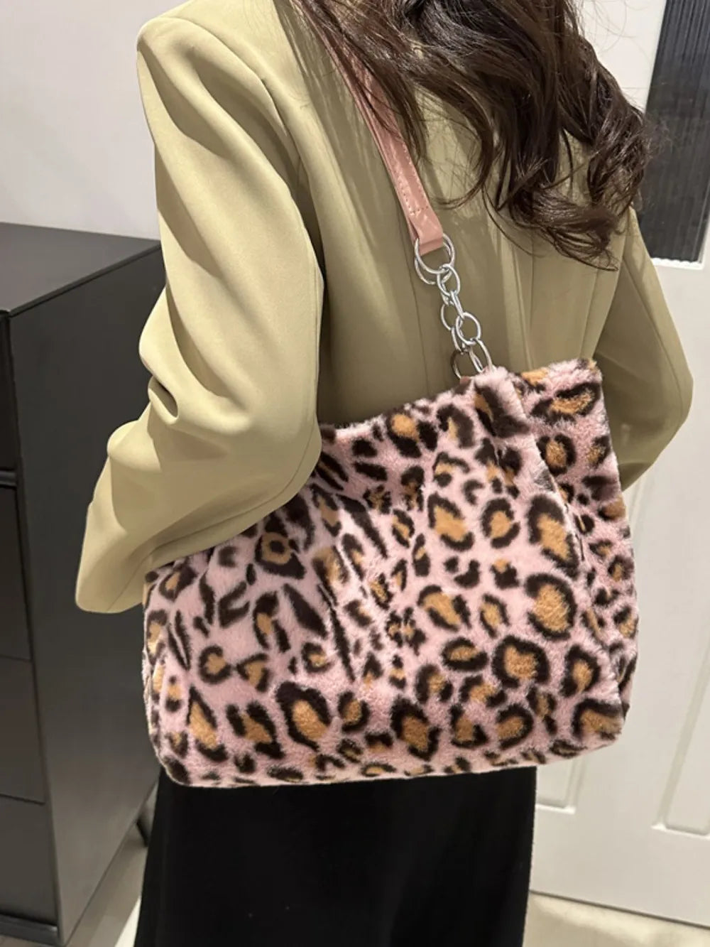 Faux Fur Leopard Shoulder Bag worn on shoulder featuring a pink leopard print and elegant design for bold everyday style.