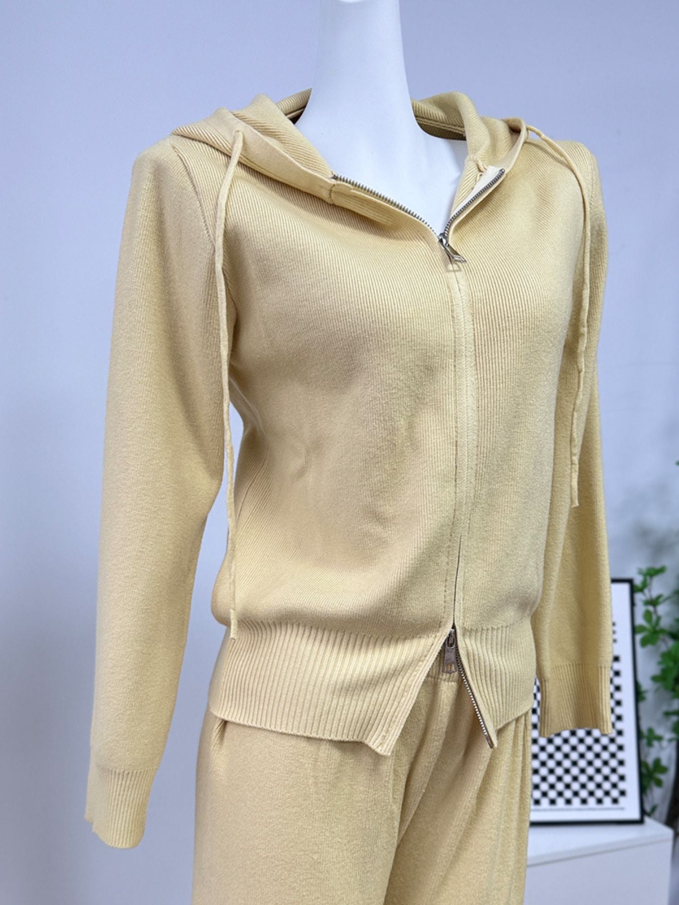Zip Up Cardigan and Wide Leg Pants Knit Set – Women's Two Piece Outfit in soft yellow color with hood and zipper.