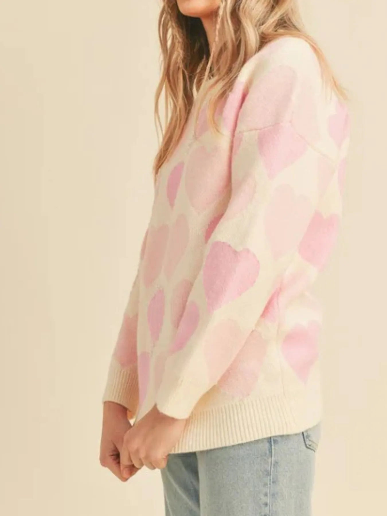 Heart Ribbed Hem Long Sleeve Sweater in soft pink and cream with heart pattern, perfect for everyday style.