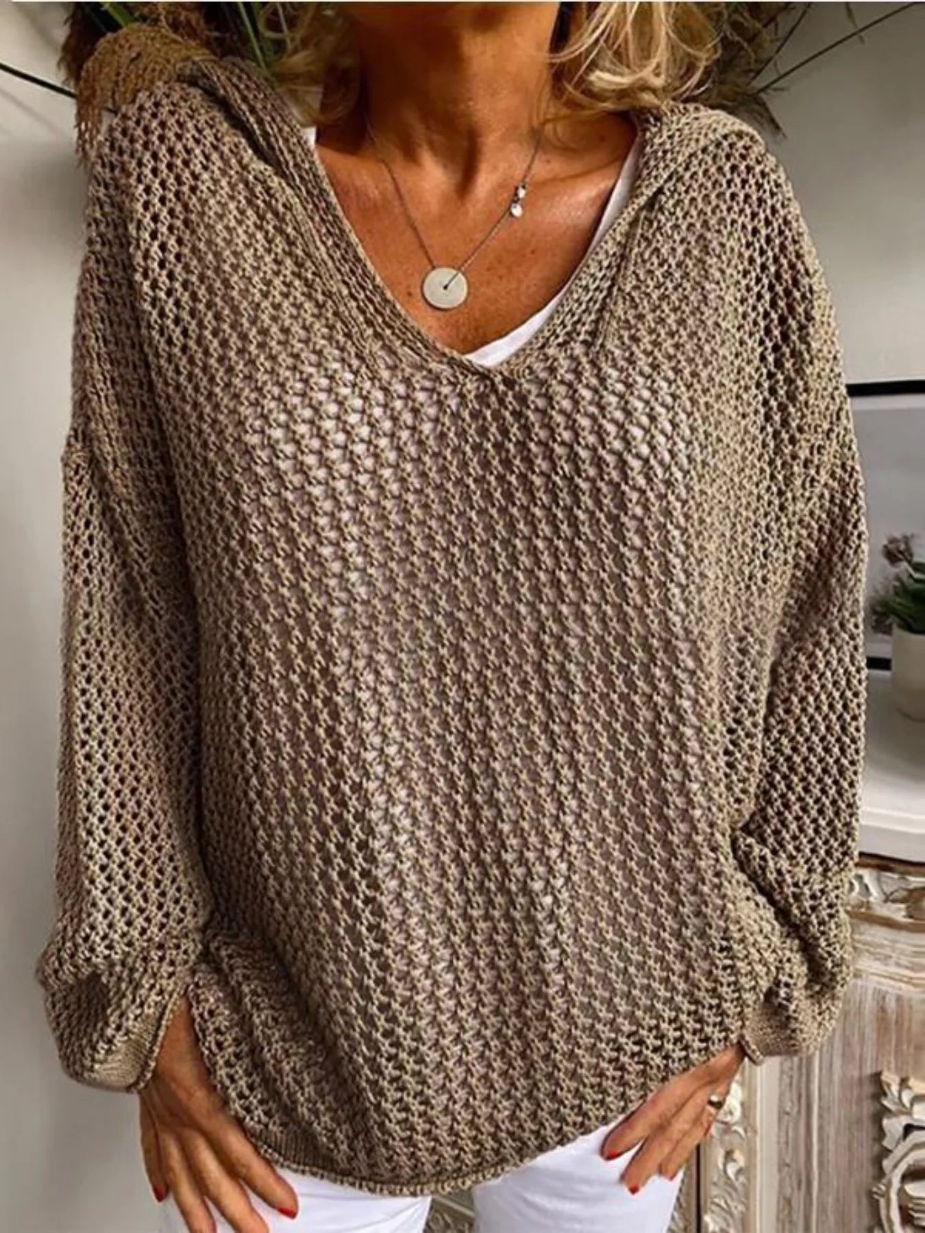 Crochet Hooded Knit Cover Up featuring a stylish cutout design in a cozy texture.