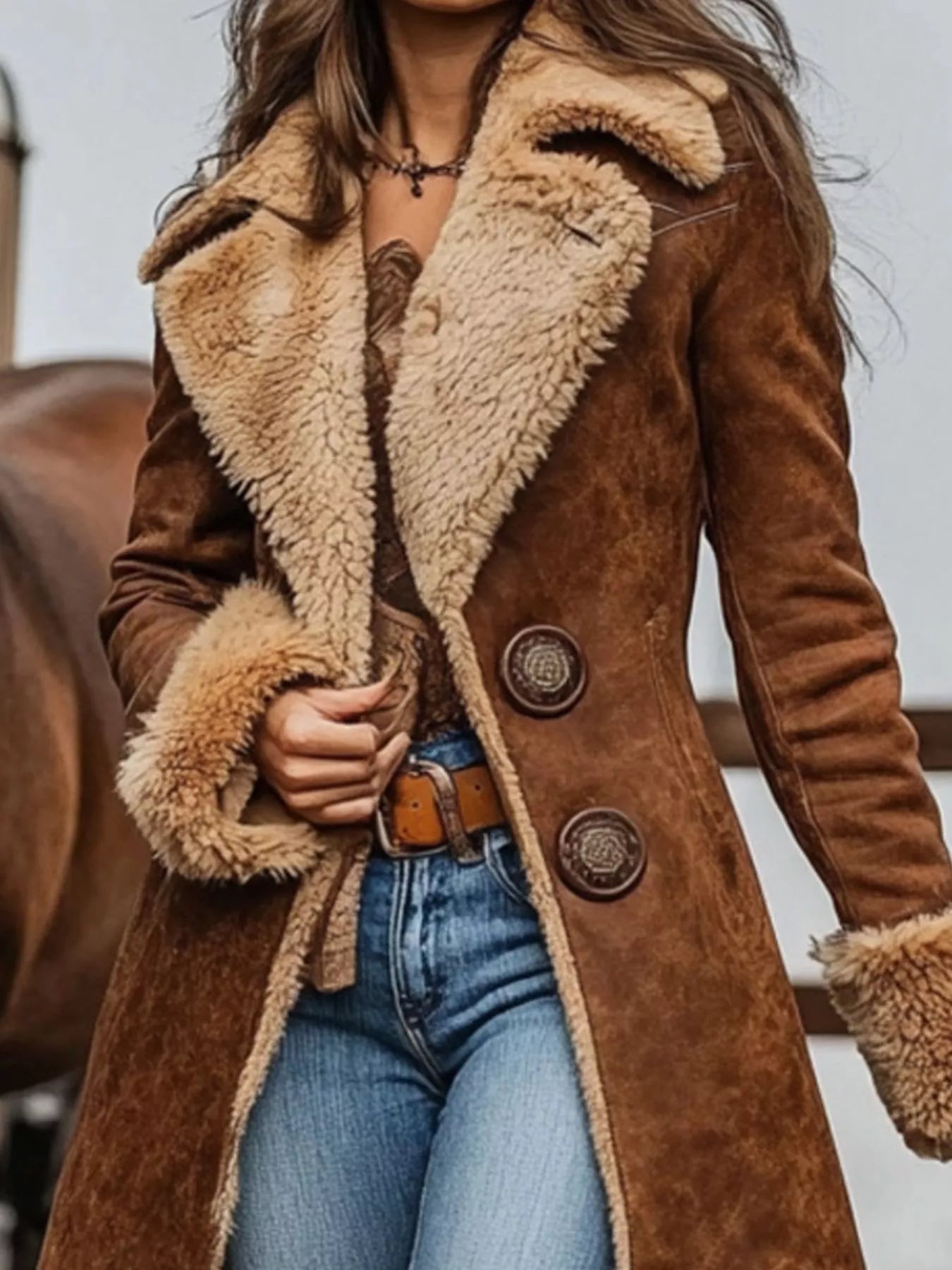 Full Size Vintage Faux Fur Trim Longline Coat worn with denim, showcasing its stylish design and warm fur accents.
