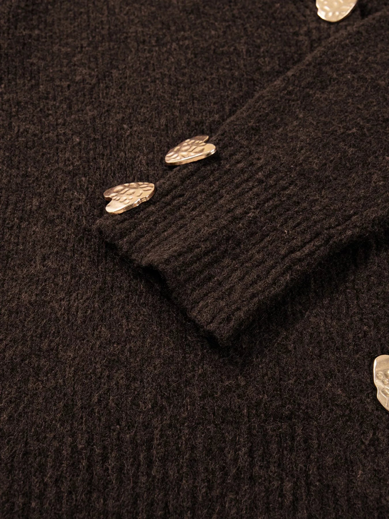 Heart Metal Button V Neck Cardigan Sweater close-up showing button details and textured fabric.