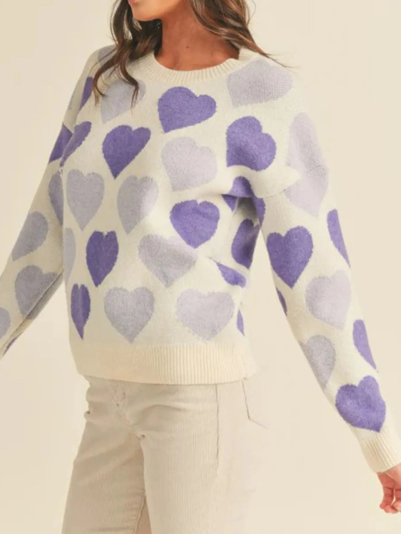 Heart Ribbed Hem Long Sleeve Sweater in cream with purple heart patterns, perfect for everyday style.