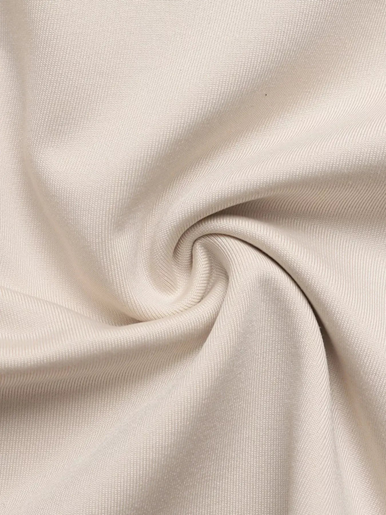 Close-up of soft fabric showcasing the texture for the sweetheart neck balloon sleeve bodysuit.