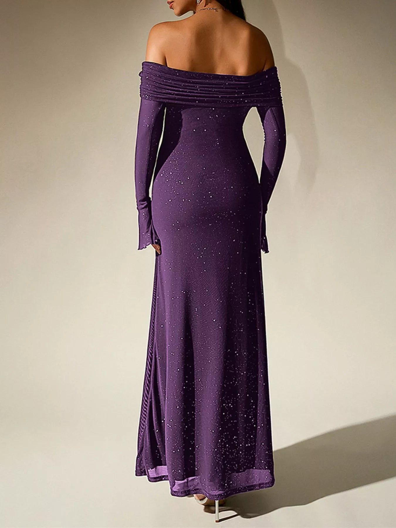 Glitter Off-Shoulder Maxi Dress in purple, showcasing the elegant back view and shimmering details.