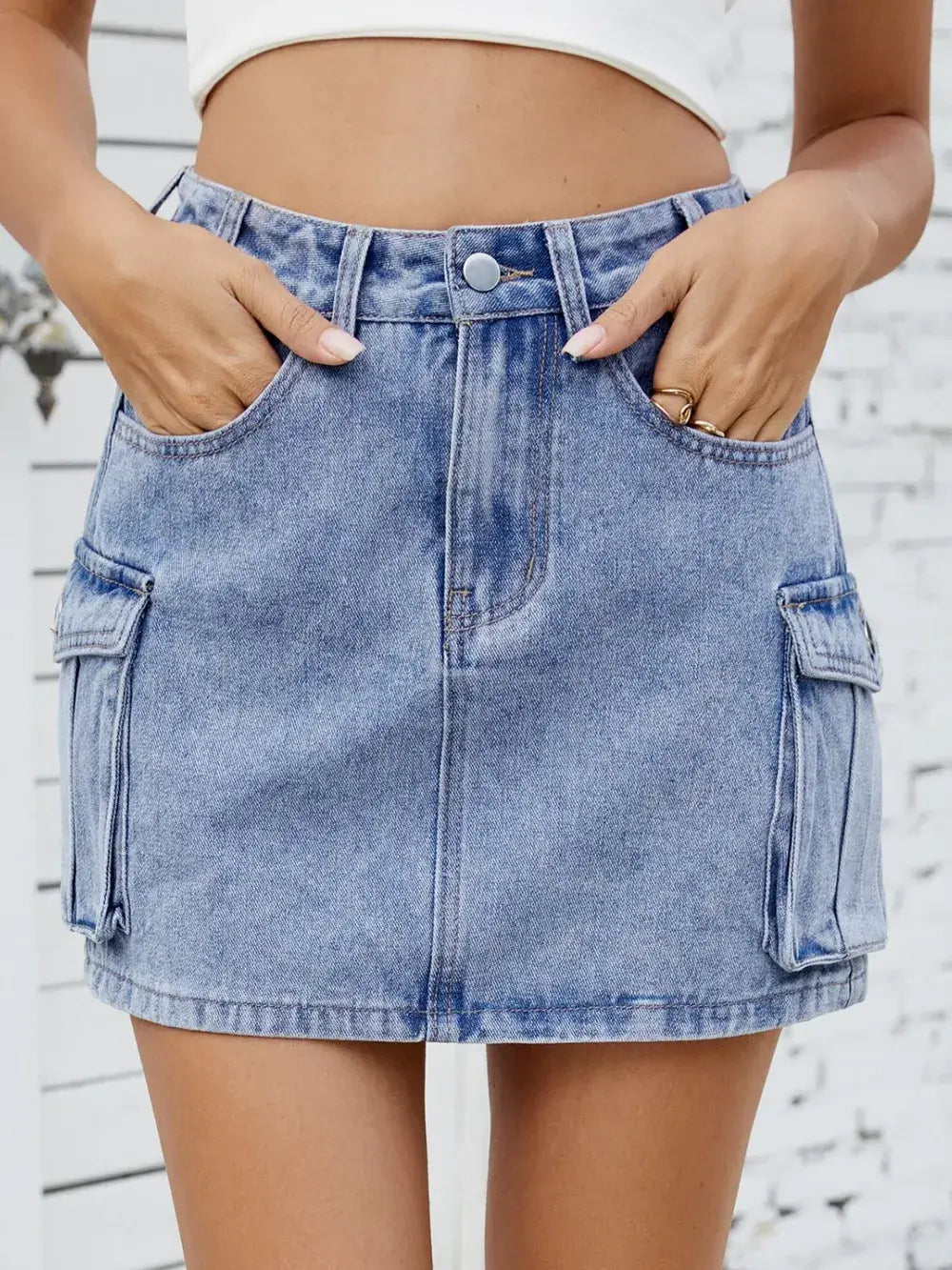 Cargo denim skirt for women featuring functional pockets and a stylish cut, perfect for casual and trendy looks.