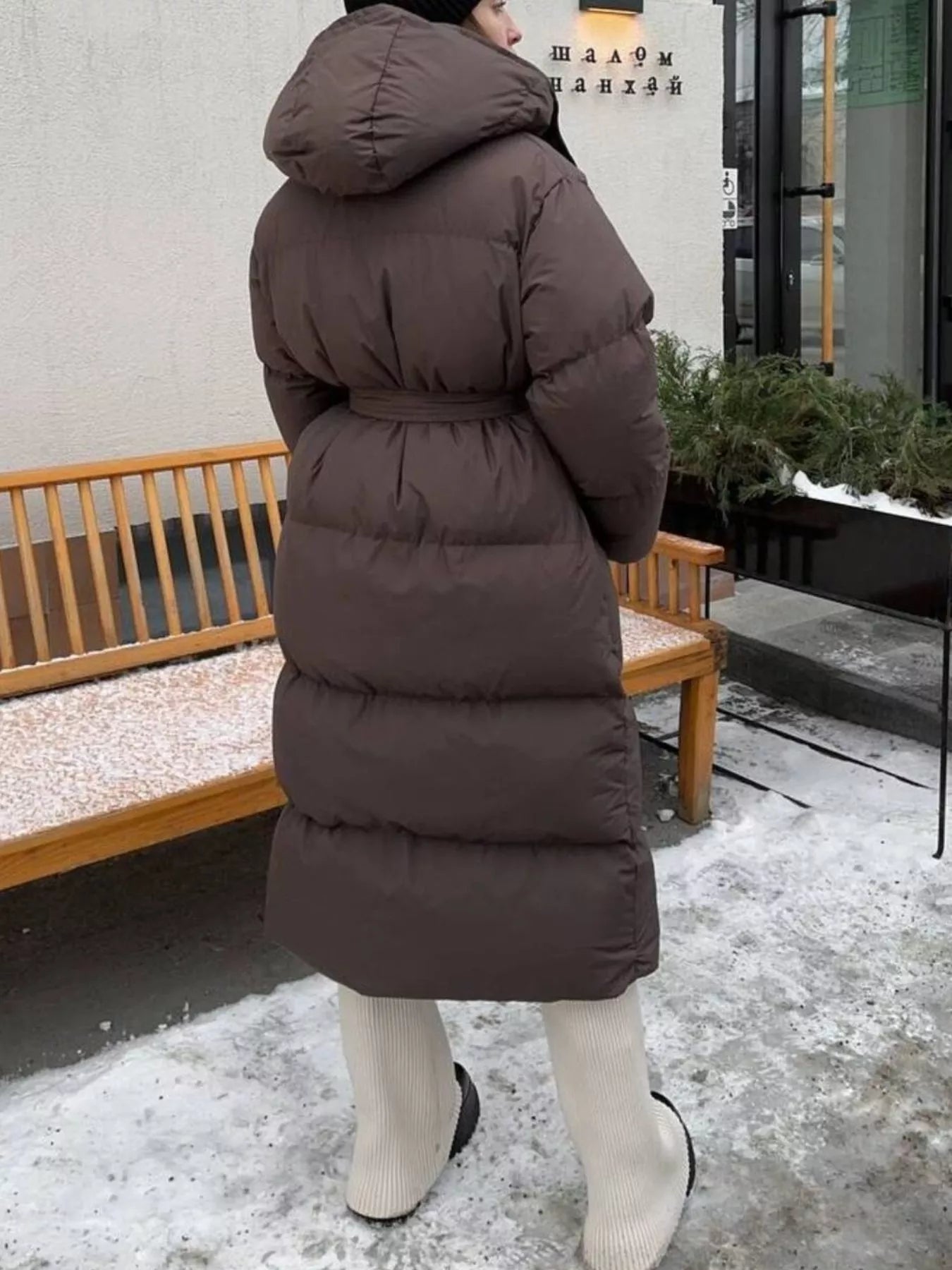 Longline Padded Winter Coat Belted warm women jacket in brown, featuring a hood and a cozy design, perfect for winter weather.