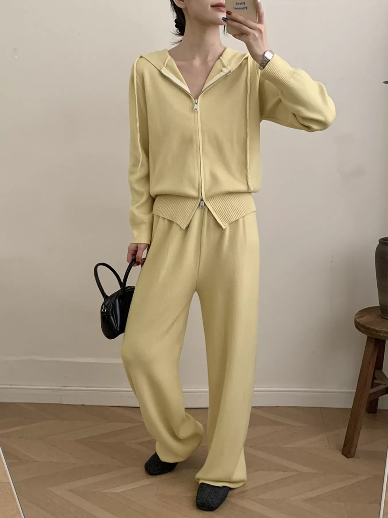 Model wearing a yellow Zip Up Cardigan and Wide Leg Pants Knit Set, featuring a zipper and drawstring.