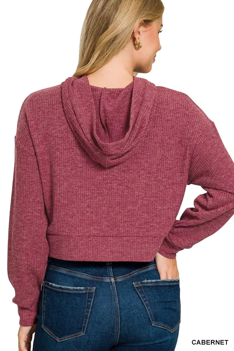 Back view of the Zenana Drop Shoulder Ribbed Crop Hoodie in Cabernet, showcasing its stylish cropped cut and relaxed fit.