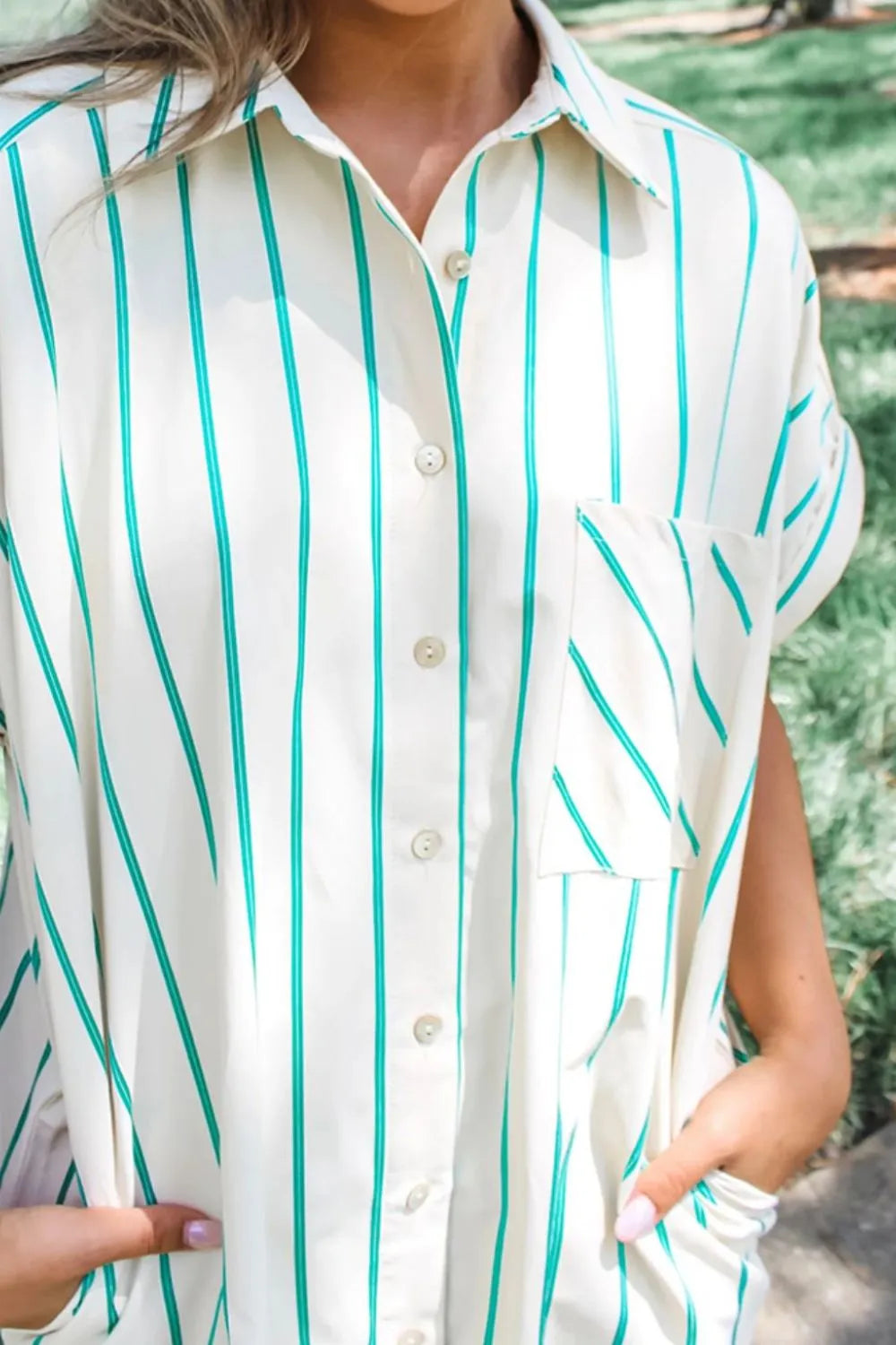 Close-up of St Patricks Striped Wide Short Sleeve Shift Mini Shirt Dress featuring green stripes and a pocket.