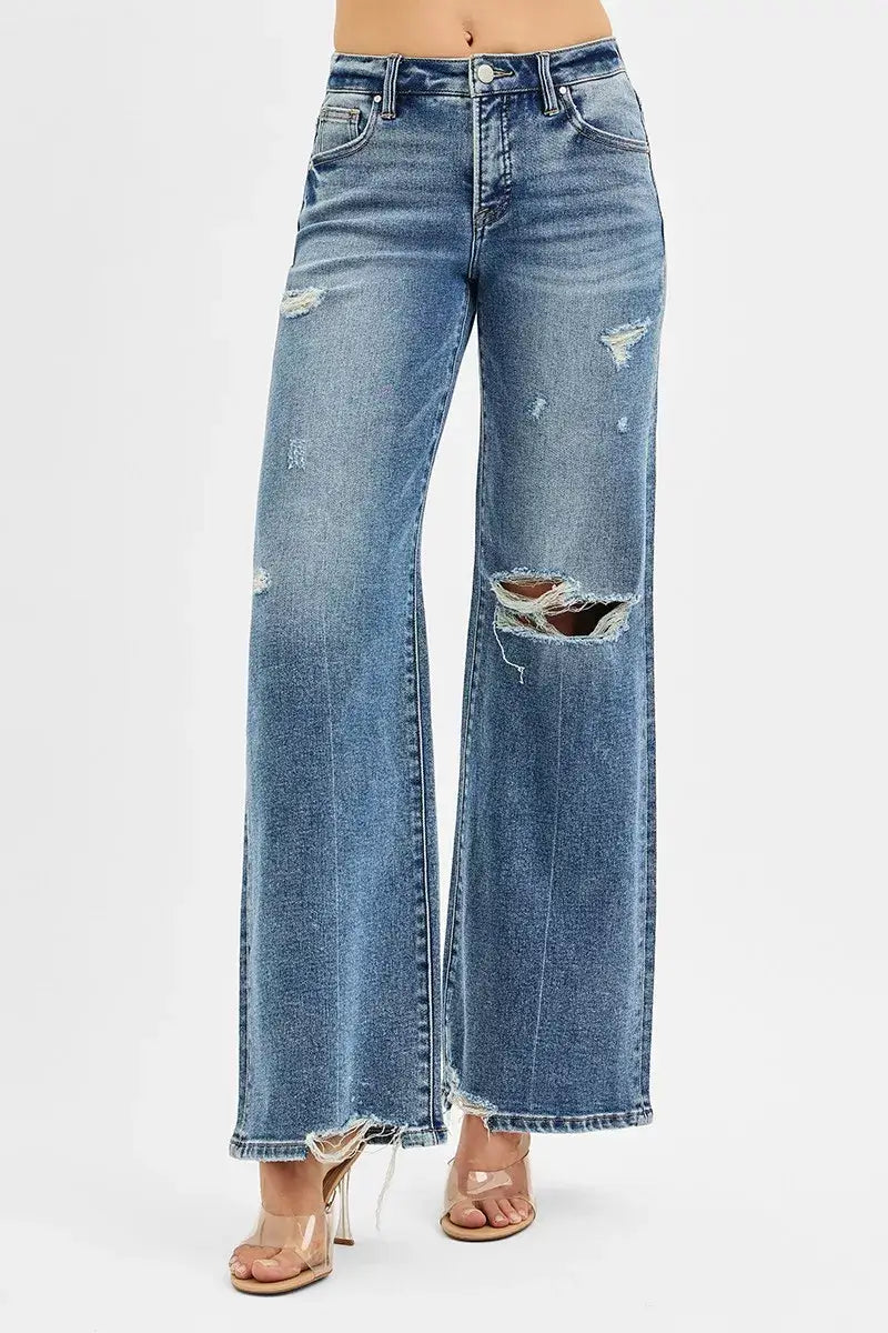 RISEN Tummy Control Mid Rise Fit Wide Jeans with distressed details and raw hem, ideal for a modern, stylish look.