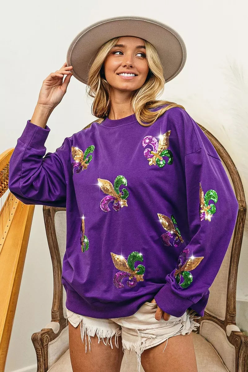 BiBi Fleur De Lis Sequin Patches Mardi Gras Sweatshirt featuring sequin patches in vibrant colors.
